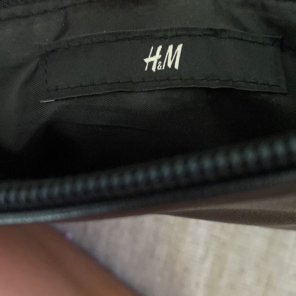 It’s a H and M bag black leather with gold points at the end and it’s spacious - Picture 7 of 7
